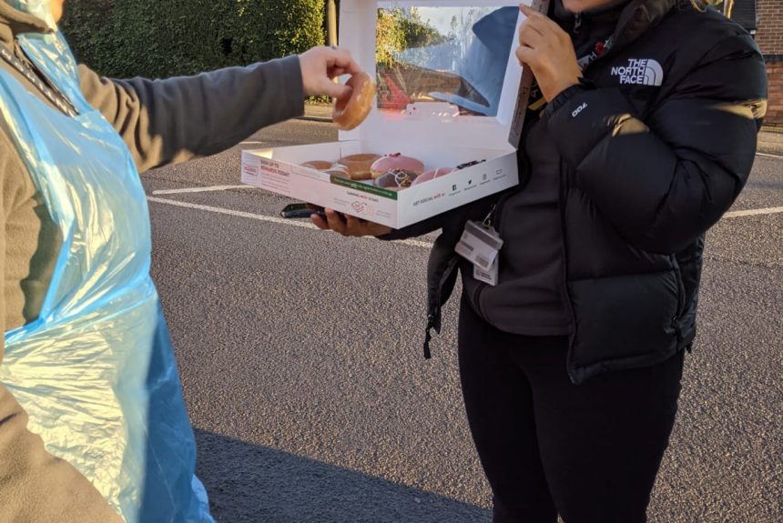 Ilkeston Care Coordinator, Elayna delivering doughnuts to the Ilkeston team out in the field