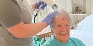 Avanti staff blow drying a client's hair